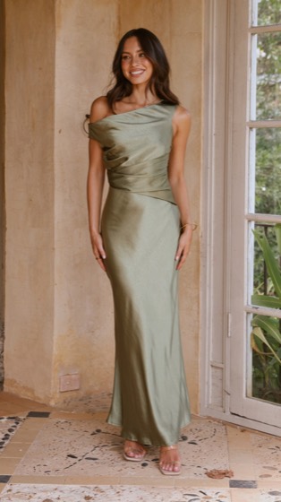 Auria off-shoulder maxi dress in olive satin, worn by a model